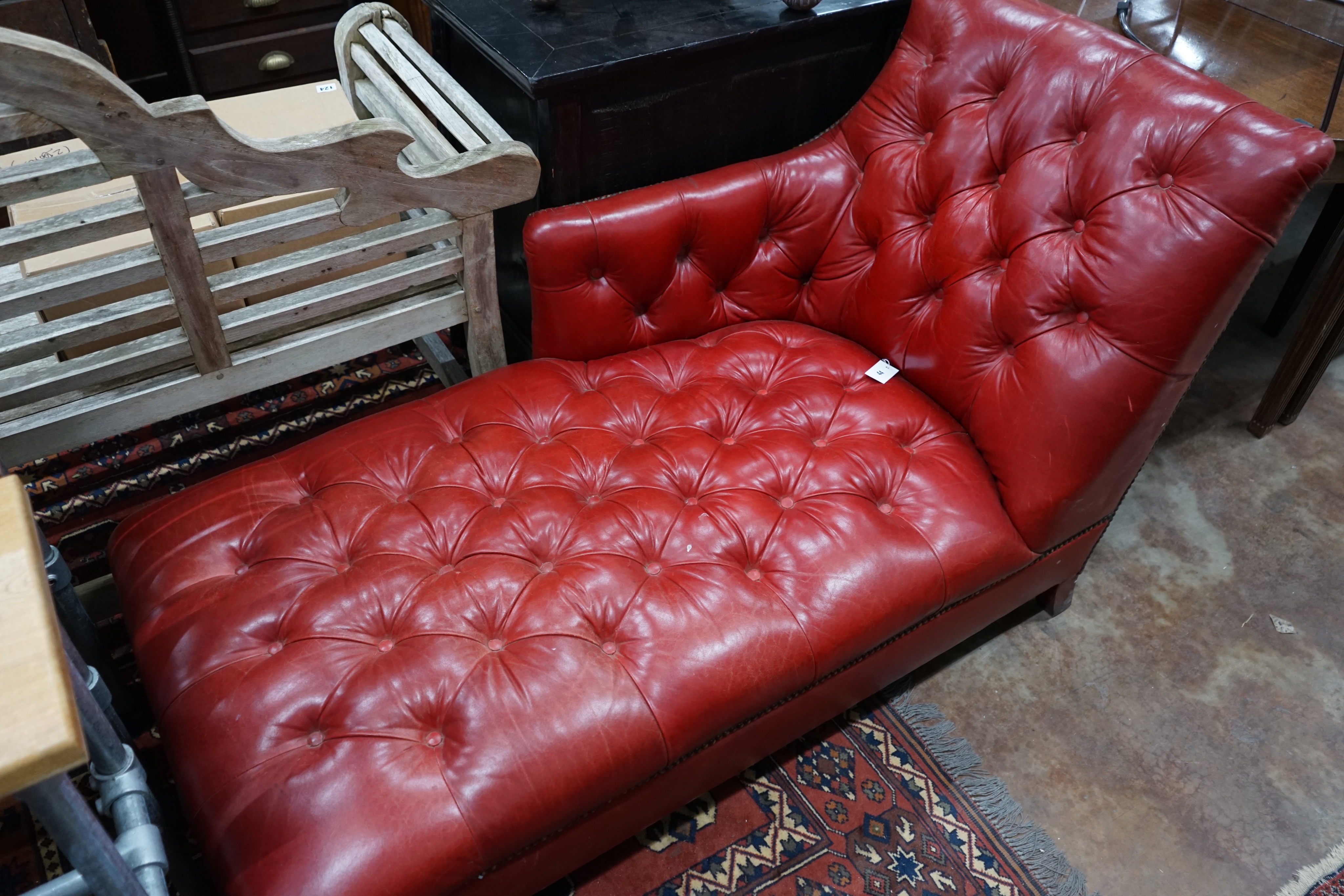 A John Lewis 'Hamlet' red leather chaise longue, width 140cm depth 72cm height 84cm